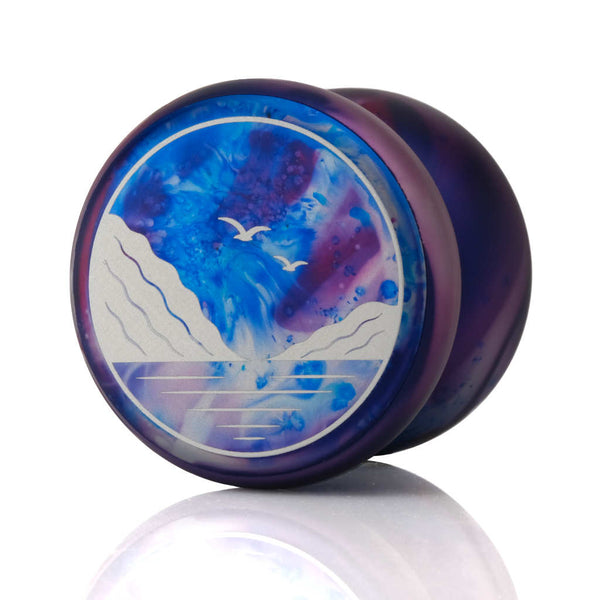 yoyofriends Tranquility YoYo in blue-purple acid wash colorway with scenic mountain and seagull cap design