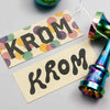 KROM 12Y BDAY iridescent Mini Metal Kendama, artwork with ken closeup