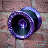 Speedaholic FX YoYo, Black body with Purple rim/hub - resting on tile path
