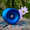 Markmont Project 2 YoYo, Blue, on tile mosaic with white flower