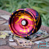 Bathysphere YoYo, Sea Apple colorway, by Mk1 YoYos and Turner Return Tops. Early morning photo, set on a mosaic tile park bench