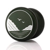 Tranquility YoYo in dark green colorway with white mountain and seagull cap engraving